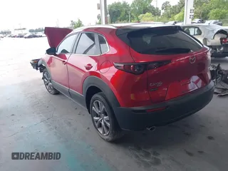 2023 Mazda CX-30 S Carbon Edition with VIN 3MVDMBCM3PM537841, listed as a IAAI auction lot 42080487 with 22,718 mi miles and . Bid and sale history available at DreamBid. Image 3.