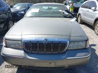 2001 Mercury Grand Marquis LS with VIN 2MEFM75W21X664449, listed as a IAAI auction lot 41898463 with 290,047 mi miles and . Bid and sale history available at DreamBid. Image 12.