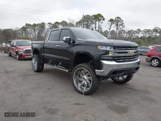 2019 Chevrolet Silverado 1500 LTZ with VIN 3GCUYGED9KG160780, listed as a IAAI auction lot 41574991 with 118,450 mi miles. Bid and sale history available at carsss.com. Image 1.