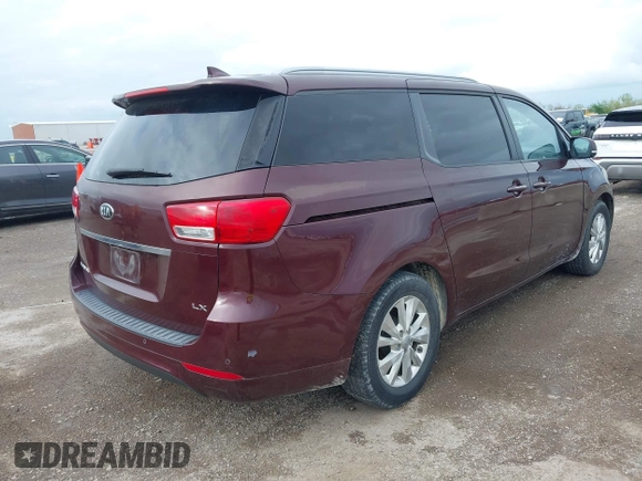 2016 Kia Sedona LX with VIN KNDMB5C10G6090643, listed as a IAAI auction lot 41911980 with 155,319 mi miles. Bid and sale history available at carsss.com. Image 4.