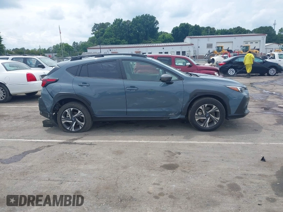 2024 Subaru Crosstrek Premium z VIN JF2GUADC7R8299418, wystawiony jako IAAI lot #42358005 z przebiegiem 21 690 mil mil oraz . Historia ofert i sprzedaży dostępna na DreamBid. Obrazek 13.