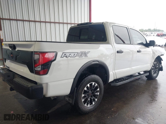 2021 Nissan Titan Pro-4X z VIN 1N6AA1ED7MN511004, wystawiony jako IAAI lot #42184599 z przebiegiem 36 086 mil mil oraz . Historia ofert i sprzedaży dostępna na DreamBid. Obrazek 4.