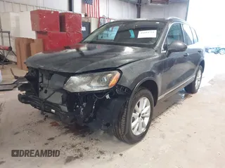 2013 Volkswagen Touareg Lux with VIN WVGEF9BP6DD007032, listed as a IAAI auction lot 41684721 with 147,249 mi miles and . Bid and sale history available at DreamBid. Image 18.