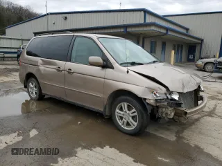 2004 Honda Odyssey EX with VIN 5FNRL186X4B127827, listed as a Copart auction lot 51602565 with 182,127 mi miles and Salvage Title. Bid and sale history available at DreamBid. Image 4.