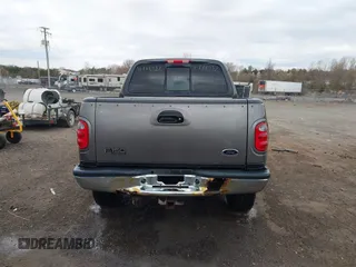2003 Ford F-150 XLT with VIN 1FTRW086X3KA54557, listed as a IAAI auction lot 41888037 with 217,512 mi miles. Bid and sale history available at carsss.com. Image 16.