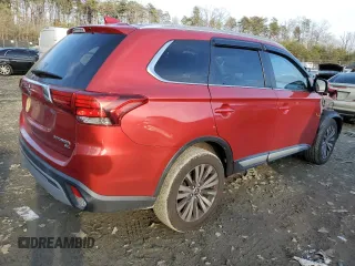 2019 Mitsubishi Outlander SE with VIN JA4AD3A30KZ034516, listed as a Copart auction lot 86527884 with 106,381 mi miles and Salvage title. Bid and sale history available at DreamBid. Image 3.