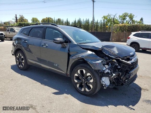 2023 Kia Sportage Plug-In Hybrid X-Line with VIN KNDPYDAHXP7107464, listed as a Copart auction lot 56829924 with 13,272 mi miles and Salvage Title. Bid and sale history available at carsss.com. Image 4.