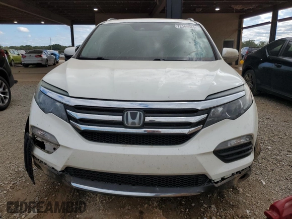 2017 Honda Pilot Touring z VIN 5FNYF6H92HB067140, wystawiony jako Copart lot #72200584 z przebiegiem 127 856 mil mil oraz Szkoda całkowita • Salvage title. Historia ofert i sprzedaży dostępna na DreamBid. Obrazek 5.