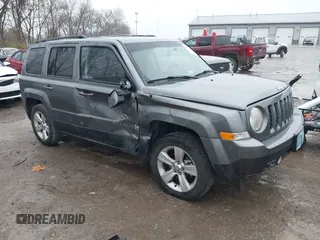 2013 Jeep Patriot Latitude with VIN 1C4NJPFB8DD129848, listed as a IAAI auction lot 40949386 with 168,839 mi miles and . Bid and sale history available at carsss.com. Image 1.