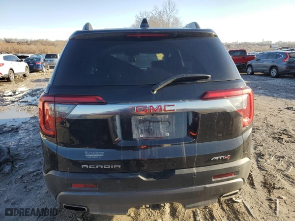 2021 GMC Acadia AT4 with VIN 1GKKNLLS3MZ124133, listed as a Copart auction lot 84187494 with 61,356 mi miles and Salvage Title. Bid and sale history available at carsss.com. Image 6.