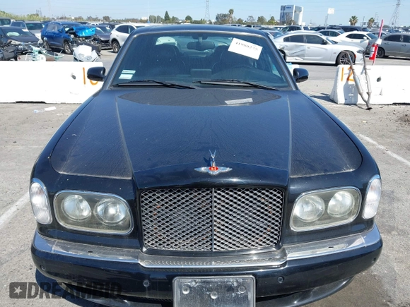 2001 Bentley Arnage with VIN SCBLC31E11CX06297, listed as a IAAI auction lot 41980275 with 63,510 mi miles and . Bid and sale history available at DreamBid. Image 12.
