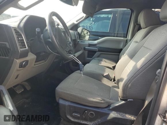 2015 Ford F-150 XL with VIN 1FTEW1CF3FFA48558, listed as a Copart auction lot 62067385 with 151,014 mi miles and Salvage title. Bid and sale history available at DreamBid. Image 7.