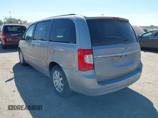 2016 Chrysler Town & Country Touring with VIN 2C4RC1BG7GR157863, listed as a IAAI auction lot 41849422 with 218,936 mi miles and . Bid and sale history available at DreamBid. Image 3.