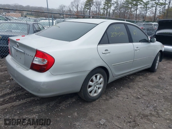 2003 Toyota Camry LE with VIN 4T1BE30K73U704489, listed as a IAAI auction lot 41905778 with Not Provided miles and . Bid and sale history available at DreamBid. Image 4.