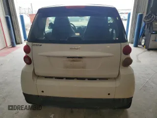 2013 Smart fortwo Pure с VIN WMEEJ3BA9DK626037, выставлен на аукционе Copart как лот 54573255 с пробегом 66 070 миль миль и Чистый • Clean title. История ставок и продаж доступна на DreamBid. Изображение 6.