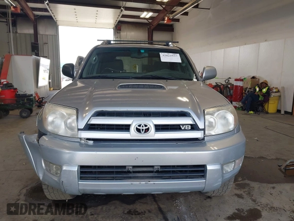 2005 Toyota 4Runner SR5 with VIN JTEBT14R858025666, listed as a IAAI auction lot 42022937 with 302,497 mi miles and . Bid and sale history available at DreamBid. Image 13.