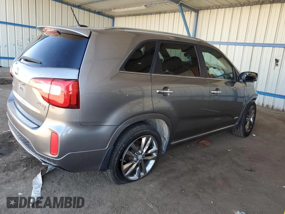 2014 Kia Sorento SX Limited with VIN 5XYKWDA74EG486713, listed as a Copart auction lot 50406585 with 144,063 mi miles and Salvage title. Bid and sale history available at DreamBid. Image 3.