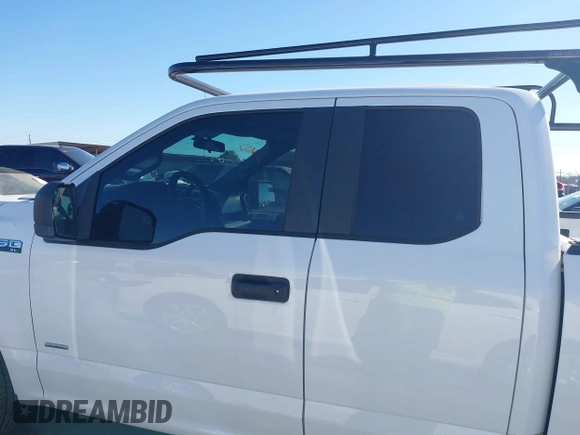 2017 Ford F-150 XL with VIN 1FTEX1CG2HKC93299, listed as a IAAI auction lot 41675673 with 101,726 mi miles. Bid and sale history available at carsss.com. Image 14.
