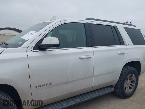 2015 Chevrolet Tahoe LS with VIN 1GNSCAEC2FR641252, listed as a IAAI auction lot 41528667 with 183,796 mi miles and . Bid and sale history available at DreamBid. Image 14.