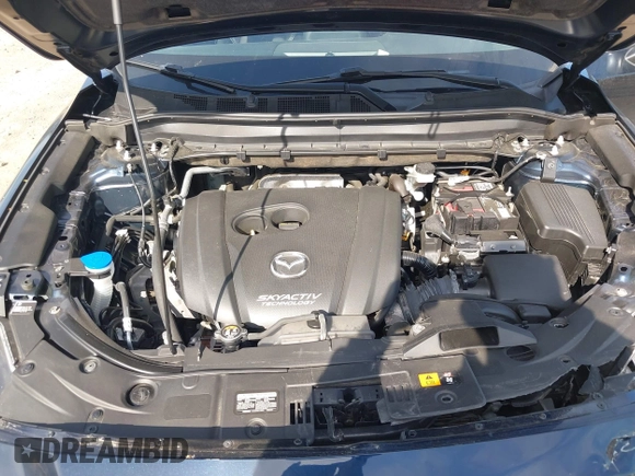 2019 Mazda CX-5 Touring with VIN JM3KFBCM8K0518806, listed as a IAAI auction lot 42038168 with 61,449 mi miles and . Bid and sale history available at DreamBid. Image 10.
