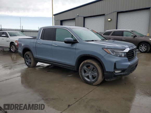 2022 Honda Ridgeline RTL-E with VIN 5FPYK3F71NB039764, listed as a Copart auction lot 52615235 with Not provided miles and Non repairable. Bid and sale history available at DreamBid. Image 4.