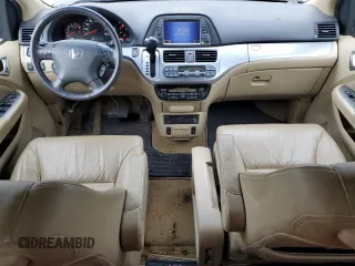 2009 Honda Odyssey Touring с VIN 5FNRL38929B048214, выставлен на аукционе Copart как лот 56735165 с пробегом 158 532 миль миль и Чистый • Clean title. История ставок и продаж доступна на DreamBid. Изображение 8.