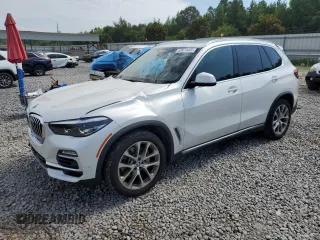 2019 BMW X5 xDrive40i with VIN 5UXCR6C5XKLK80703, listed as a Copart auction lot 63473495 with 57,260 mi miles and Salvage title. Bid and sale history available at DreamBid. Image 1.