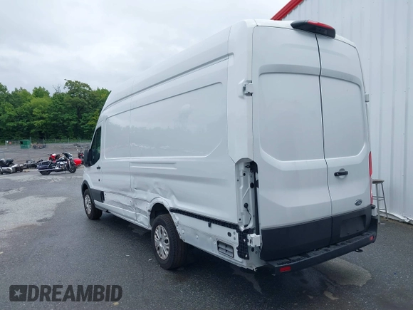 2023 Ford Transit Cargo with VIN 1FTBW3XG1PKB89459, listed as a IAAI auction lot 39961794 with 6,756 mi miles and . Bid and sale history available at carsss.com. Image 3.