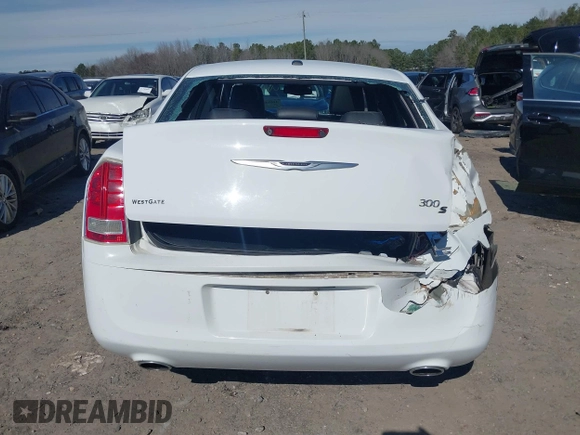 2013 Chrysler 300 with VIN 2C3CCABGXDH699096, listed as a IAAI auction lot 41614034 with 136,344 mi miles. Bid and sale history available at carsss.com. Image 17.