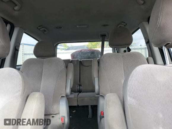 2012 Kia Sedona LX with VIN KNDMG4C79C6496785, listed as a Copart auction lot 73310344 with 130,243 mi miles and Salvage Title. Bid and sale history available at carsss.com. Image 10.