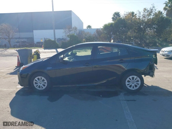 2021 Toyota Prius L Eco with VIN JTDKAMFU0M3133871, listed as a IAAI auction lot 41364847 with 66,102 mi miles. Bid and sale history available at carsss.com. Image 15.