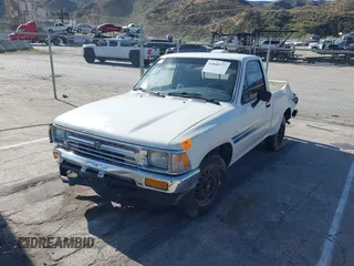 1994 Toyota Pickup DX with VIN JT4RN81P1R5194136, listed as a IAAI auction lot 41848772 with 170,759 mi miles and . Bid and sale history available at DreamBid. Image 2.