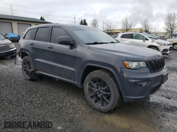 2018 Jeep Grand Cherokee Altitude with VIN 1C4RJFAG5JC219944, listed as a Copart auction lot 52030365 with 99,463 mi miles and Salvage title. Bid and sale history available at DreamBid. Image 4.