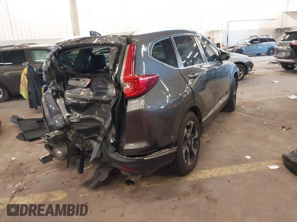 2018 Honda CR-V Touring with VIN 2HKRW2H91JH634457, listed as a IAAI auction lot 41697658 with 101,878 mi miles. Bid and sale history available at carsss.com. Image 4.