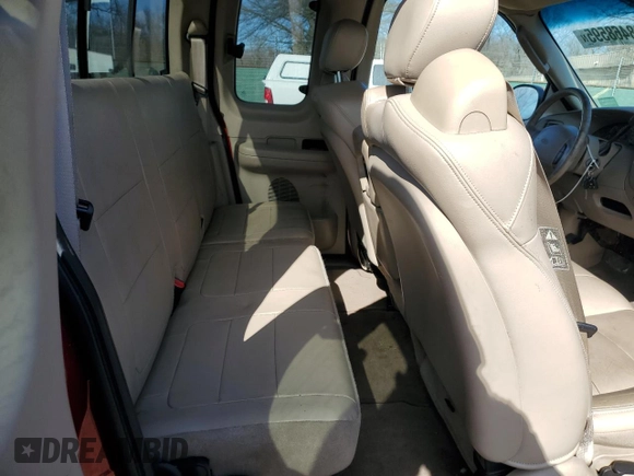 2002 Ford F-150 XL with VIN 1FTRX17L02NB60040, listed as a Copart auction lot 48468595 with 119,096 mi miles and Clean title. Bid and sale history available at DreamBid. Image 10.