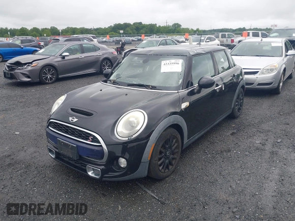 2015 MINI Hardtop 4 Door S with VIN WMWXU3C55F2B56429, listed as a IAAI auction lot 42335996 with 114,781 mi miles and . Bid and sale history available at DreamBid. Image 18.
