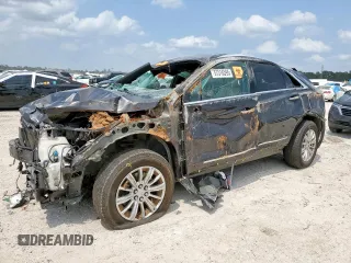 2018 Cadillac XT5 FWD with VIN 1GYKNARS6JZ147628, listed as a Copart auction lot 57516595 with 113,092 mi miles and Non repairable. Bid and sale history available at DreamBid. Image 1.