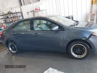 2016 Toyota Corolla L with VIN 5YFBURHE1GP482365, listed as a IAAI auction lot 41902840 with 124,165 mi miles and . Bid and sale history available at DreamBid. Image 13.