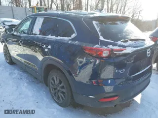 2021 Mazda CX-9 Touring with VIN JM3TCBCY3M0510194, listed as a IAAI auction lot 41340118 with 65,902 mi miles. Bid and sale history available at carsss.com. Image 3.