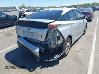 2018 Toyota Prius Two with VIN JTDKBRFU6J3603990, listed as a IAAI auction lot 42151090 with 71,388 mi miles and . Bid and sale history available at DreamBid. Image 4.