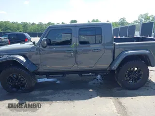 2022 Jeep Gladiator High Altitude with VIN 1C6HJTFG5NL149751, listed as a IAAI auction lot 42257917 with 24,603 mi miles and . Bid and sale history available at DreamBid. Image 14.