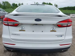 2020 Ford Fusion Titanium with VIN 3FA6P0D94LR133269, listed as a IAAI auction lot 42607013 with 89,406 mi miles and . Bid and sale history available at DreamBid. Image 16.