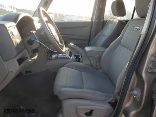 2006 Jeep Commander with VIN 1J8HG48K56C293759, listed as a Copart auction lot 86231064 with 173,203 mi miles and Salvage Title. Bid and sale history available at carsss.com. Image 7.