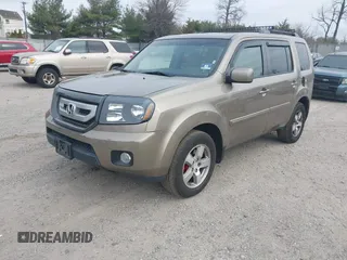 2011 Honda Pilot EX-L with VIN 5FNYF4H68BB038615, listed as a IAAI auction lot 41785830 with 164,324 mi miles and . Bid and sale history available at carsss.com. Image 18.