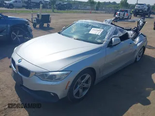 2014 BMW 4 Series 428i with VIN WBA3V7C55EJ873028, listed as a IAAI auction lot 42432699 with 24,063 mi miles and . Bid and sale history available at DreamBid. Image 18.