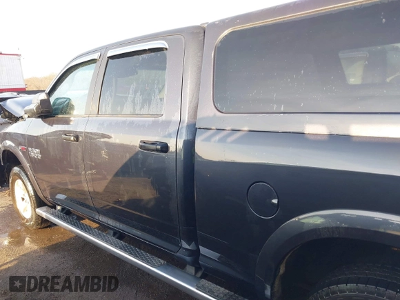 2015 Ram 1500 Big Horn with VIN 1C6RR7TM7FS569176, listed as a IAAI auction lot 41474950 with 220,742 mi miles and . Bid and sale history available at DreamBid. Image 14.