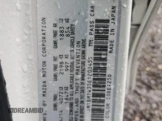 2014 Mazda 3 S Grand Touring with VIN JM1BM1W35E1203455, listed as a Copart auction lot 52094705 with 100,026 mi miles and Salvage Title. Bid and sale history available at DreamBid. Image 12.
