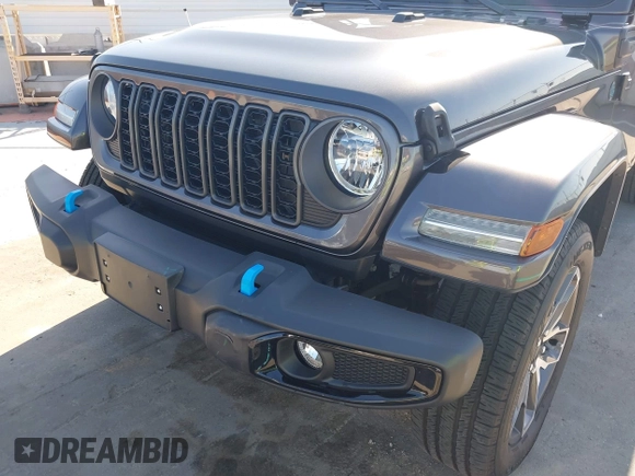2024 Jeep Wrangler Sport S with VIN 1C4RJXN61RW192386, listed as a IAAI auction lot 42001810 with 7,426 mi miles and . Bid and sale history available at DreamBid. Image 6.