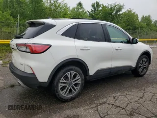 2021 Ford Escape SEL with VIN 1FMCU9H67MUA64853, listed as a Copart auction lot 60093115 with 105,724 mi miles and Clean title. Bid and sale history available at DreamBid. Image 3.