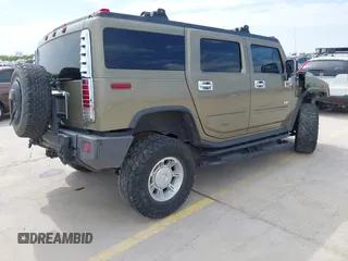 2006 Hummer H2 with VIN 5GRGN23U56H102574, listed as a IAAI auction lot 41955539 with 202,102 mi miles. Bid and sale history available at carsss.com. Image 4.